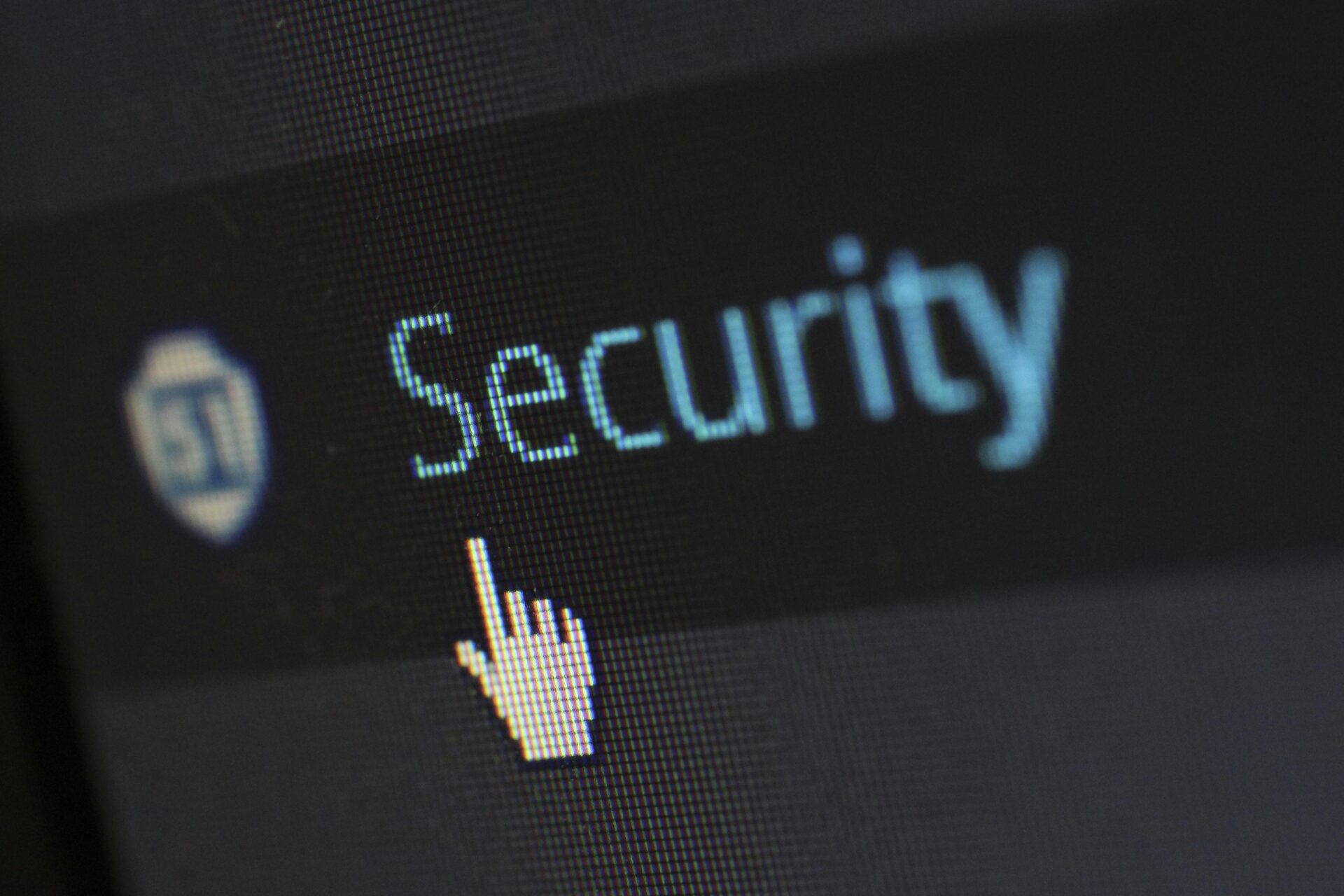 The word 'security' appears on the computer screen.